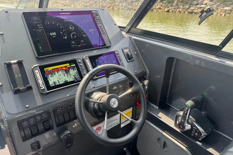 Slide: The Image of 2023 Extreme Boats 795 Game King dashboard with advanced navigation and control systems. - 20