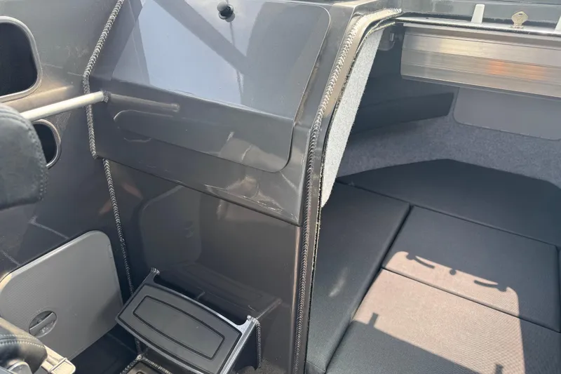 Slide: The Image of Interior of 2023 Extreme Boats 795 Game King, showcasing cabin and seating area. - 22