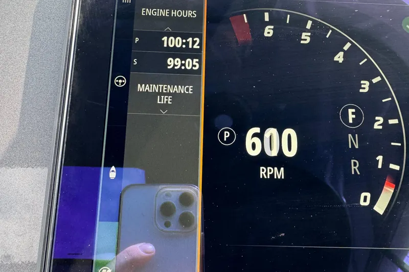 Slide: The Image of Dashboard of 2023 Extreme Boats 795 Game King showing 600 RPM and engine hours. - 29