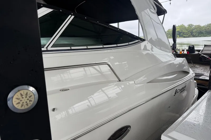 Slide: The Image of 2001 Cruisers Yachts 3672 Express docked, showcasing sleek design and modern features. - 10