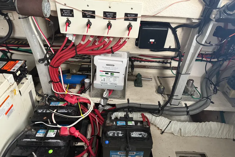 Slide: The Image of Electrical system of a 2001 Cruisers Yachts 3672 Express with batteries and wiring. - 36