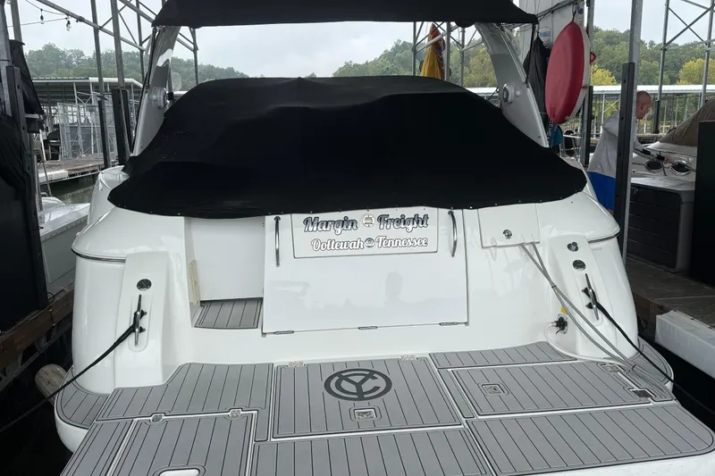 Slide: The Image of 2001 Cruisers Yachts 3672 Express docked, rear view with covered deck, Tennessee location. - 4