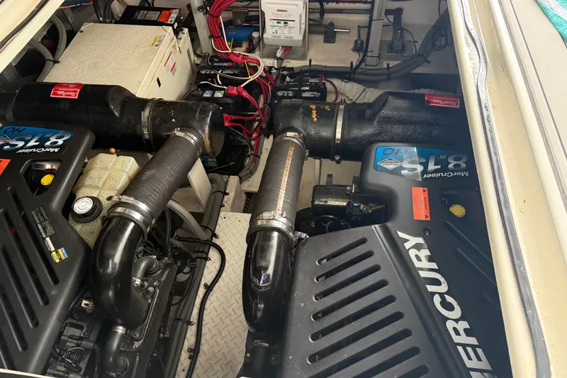 Slide: The Image of Engine compartment of a 2001 Cruisers Yachts 3672 Express with Mercury engines. - 40