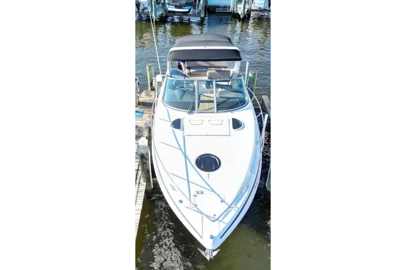 Slide: The Image of 2015 Regal 32 Express boat docked at marina, aerial view. - 6