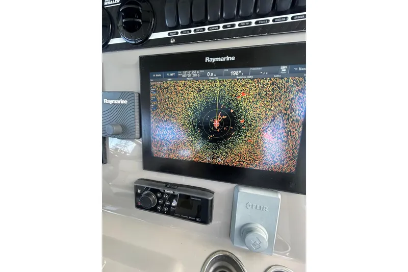 Slide: The Image of Control panel of a 2017 Boston Whaler 380 Outrage with Raymarine display. - 7