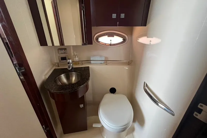 Slide: The Image of Luxurious bathroom in 2007 Sea Ray 36 Sedan Bridge yacht with sink and toilet. - 35