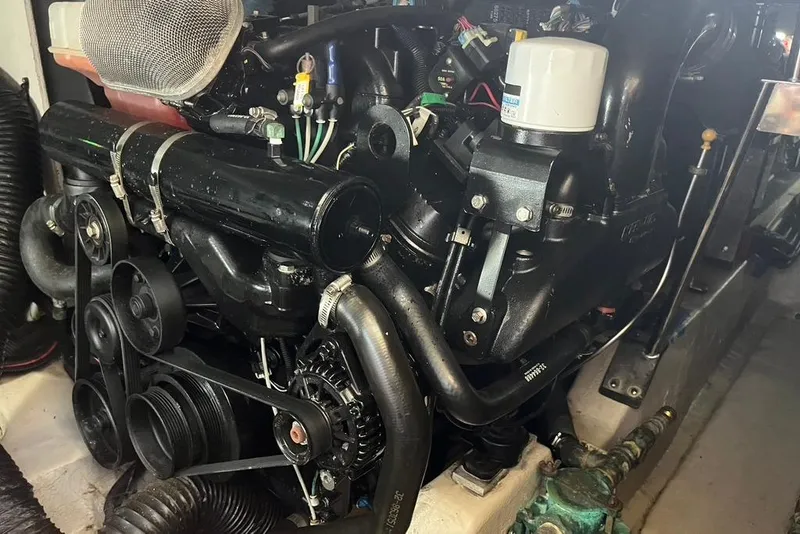 Slide: The Image of Engine of a 2007 Sea Ray 36 Sedan Bridge boat, showcasing mechanical components. - 37