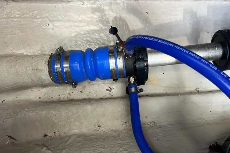 Slide: The Image of Blue silicone heater hose in 2007 Sea Ray 36 Sedan Bridge engine compartment. - 44