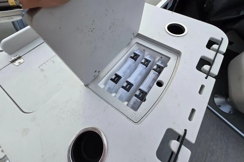 Slide: The Image of 2022 Sylvan L3 Party Fish boat with open storage compartment and cup holder. - 15