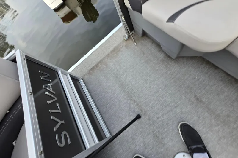 Slide: The Image of Interior view of 2022 Sylvan L3 Party Fish boat with seating and flooring. - 20