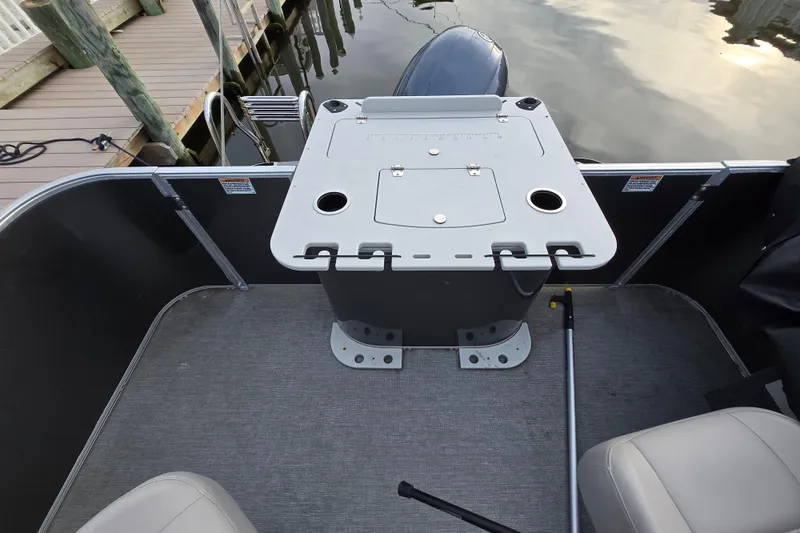 Slide: The Image of 2022 Sylvan L3 Party Fish boat interior with fishing station and seating. - 7