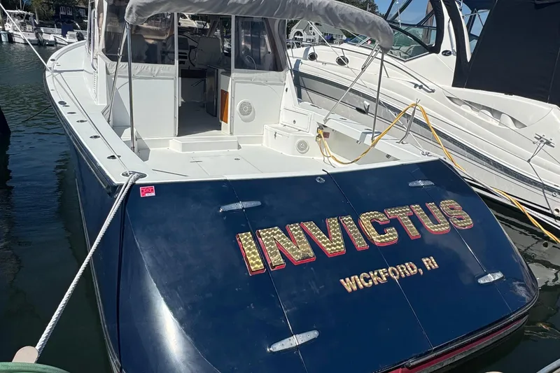 Slide: The Image of 2004 True North 38 Heritage boat named "Invictus" docked in Wickford, RI marina. - 3