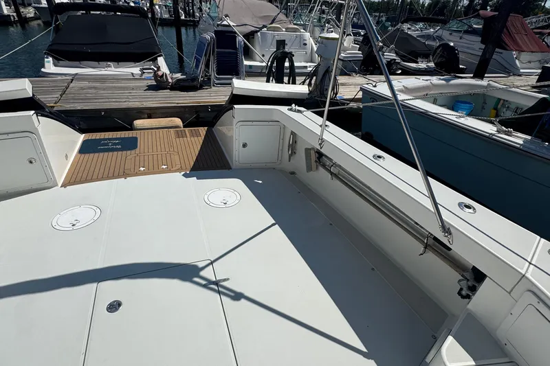 Slide: The Image of Cockpit view of 2004 True North 38 Heritage yacht docked at marina. - 8