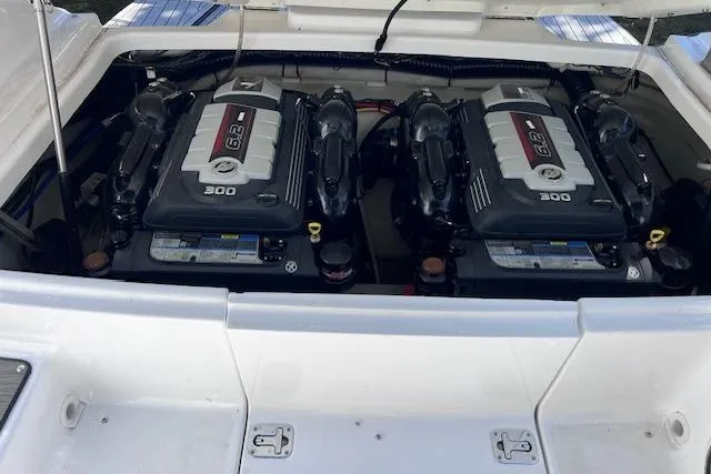 Slide: The Image of Twin engines of 2023 Four Winns H290 boat, showcasing powerful performance. - 61