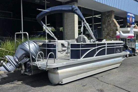 The Image of 2020 Bennington SXP 21 SLXP pontoon boat with canopy and outboard motor. - 0