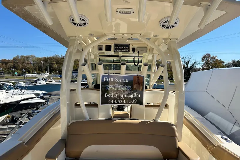 Slide: The Image of 2017 Scout 350 LXF boat for sale, interior view with contact information displayed. - 43