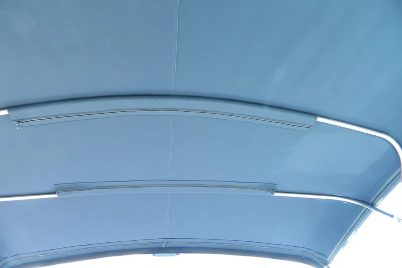 Slide: The Image of Blue canopy of 1999 Tiara Yachts 2900 Coronet with metal support frame. - 3