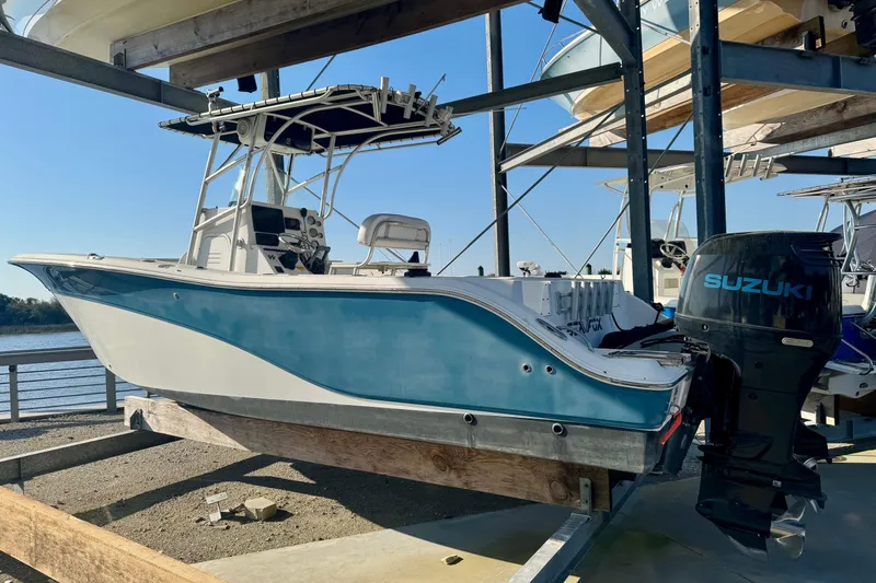 Slide: The Image of 2008 Sea Fox 256 Commander boat with Suzuki outboard motor on dry dock. - 8
