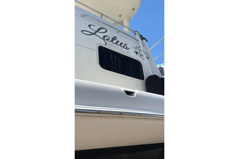 Slide: The Image of 2005 Meridian 368 Motoryacht with "Lotus" name, docked in Bristol, RI. - 15