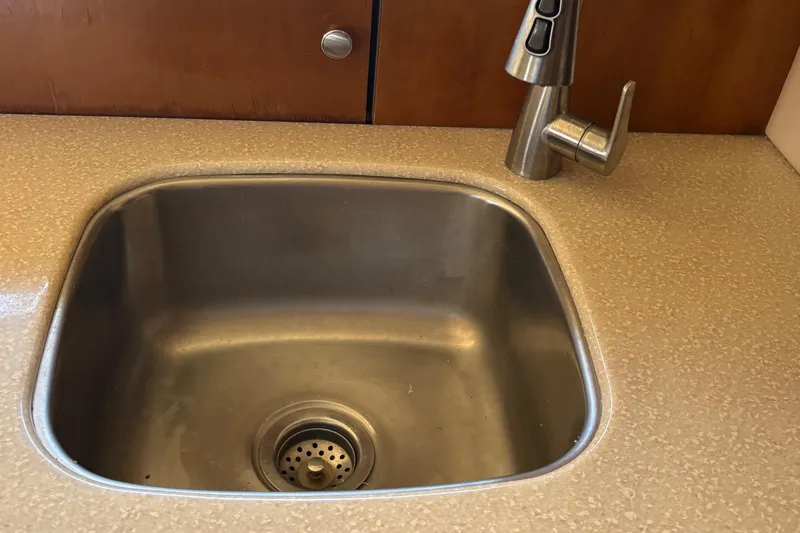 Slide: The Image of Stainless steel sink and faucet in 2005 Meridian 368 Motoryacht kitchen. - 22