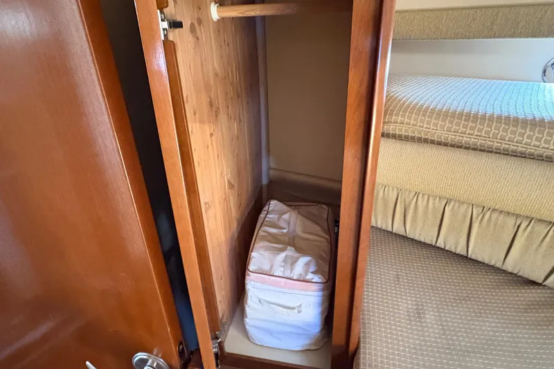 Slide: The Image of Wooden closet and bed inside 2005 Meridian 368 Motoryacht cabin. - 35