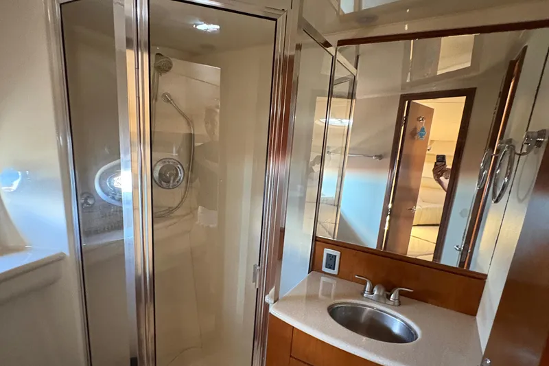 Slide: The Image of Luxurious bathroom in 2005 Meridian 368 Motoryacht with shower and sink. - 37