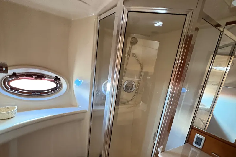 Slide: The Image of Luxurious bathroom in 2005 Meridian 368 Motoryacht with shower and porthole window. - 39