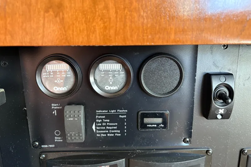 Slide: The Image of Control panel of a 2005 Meridian 368 Motoryacht with Onan gauges and switches. - 41