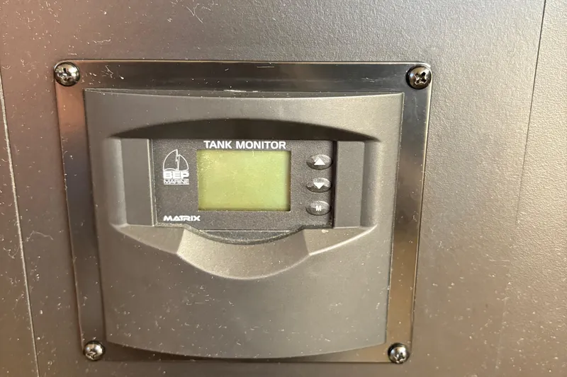 Slide: The Image of BEP Marine tank monitor on 2005 Meridian 368 Motoryacht dashboard. - 42