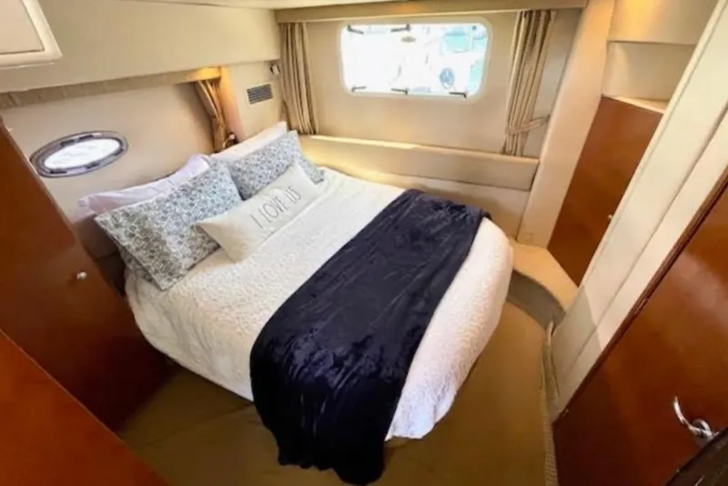 Slide: The Image of Luxurious bedroom in 2005 Meridian 368 Motoryacht with cozy bedding and elegant decor. - 51
