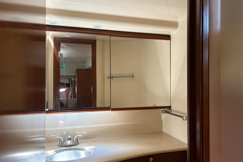 Slide: The Image of Bathroom interior of 2005 Meridian 368 Motoryacht with mirror and sink. - 54