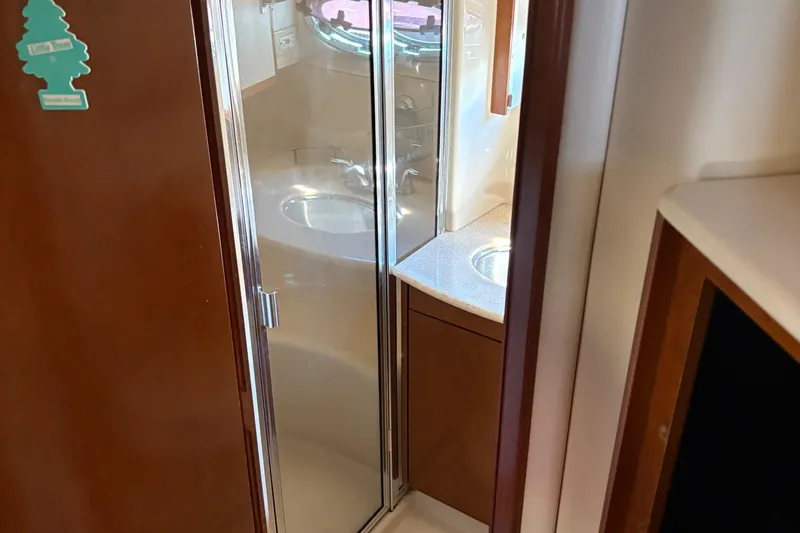Slide: The Image of Interior of 2005 Meridian 368 Motoryacht bathroom with shower and sink. - 55