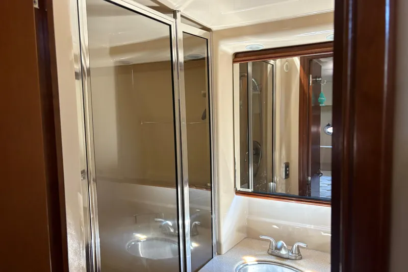 Slide: The Image of Bathroom interior of 2005 Meridian 368 Motoryacht with shower and sink. - 58