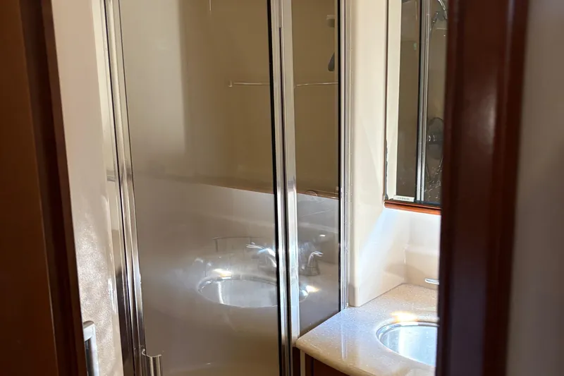 Slide: The Image of Bathroom interior of 2005 Meridian 368 Motoryacht with shower and sink. - 59