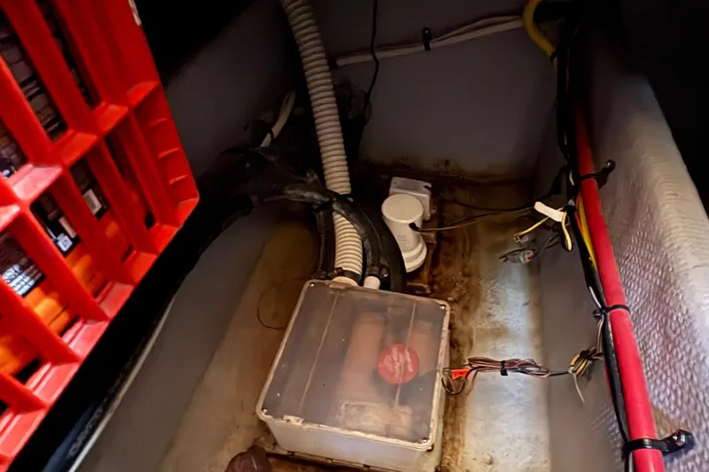 Slide: The Image of Engine compartment of 2005 Meridian 368 Motoryacht with visible wiring and components. - 70