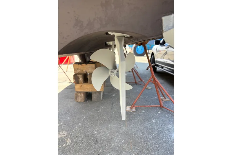 Slide: The Image of Propeller of 2005 Meridian 368 Motoryacht on dry dock, supported by stands. - 77