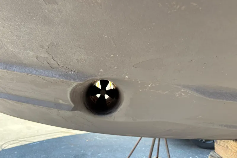 Slide: The Image of Close-up of a 2005 Meridian 368 Motoryacht hull with a visible thruster. - 83