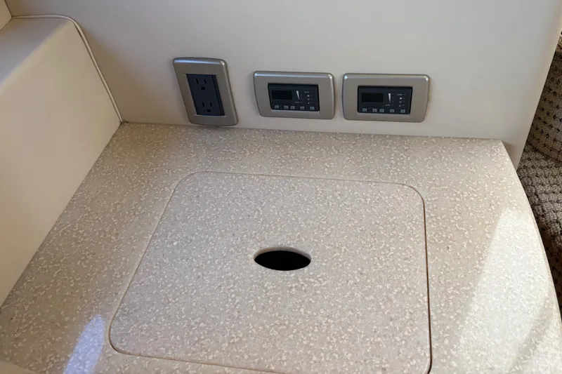 Slide: The Image of 2005 Meridian 368 Motoryacht interior with power outlets and control panels. - 20