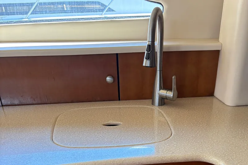 Slide: The Image of Modern kitchen sink and faucet in 2005 Meridian 368 Motoryacht interior. - 21