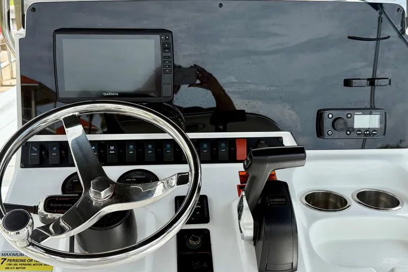 Slide: The Image of 2019 Sea Hunt BX 20 BR boat dashboard with Garmin display and controls. - 26