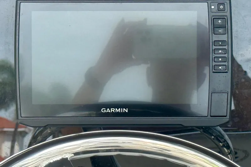 Slide: The Image of Garmin display on 2019 Sea Hunt BX 20 BR boat dashboard with steering wheel. - 27