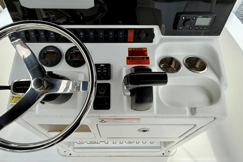 Slide: The Image of 2019 Sea Hunt BX 20 BR boat console with steering wheel and controls. - 28