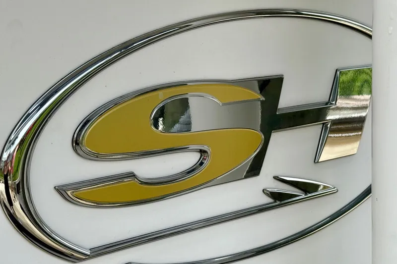 Slide: The Image of Logo of 2019 Sea Hunt BX 20 BR boat with chrome and yellow design. - 36