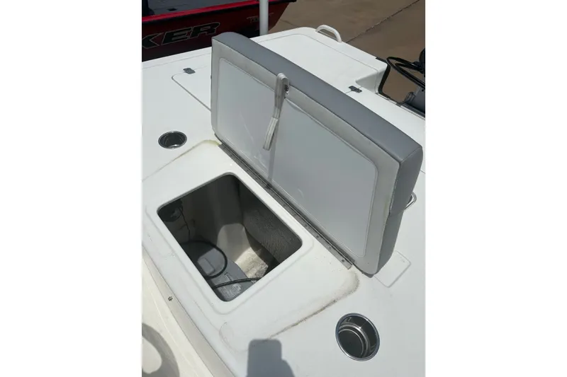 Slide: The Image of 2026 Mako 18 Pro Skiff boat with open storage compartment on deck. - 14