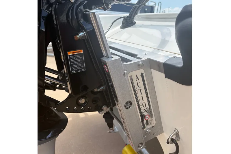 Slide: The Image of Close-up of 2026 Mako 18 Pro Skiff boat motor mount and hydraulic system. - 20