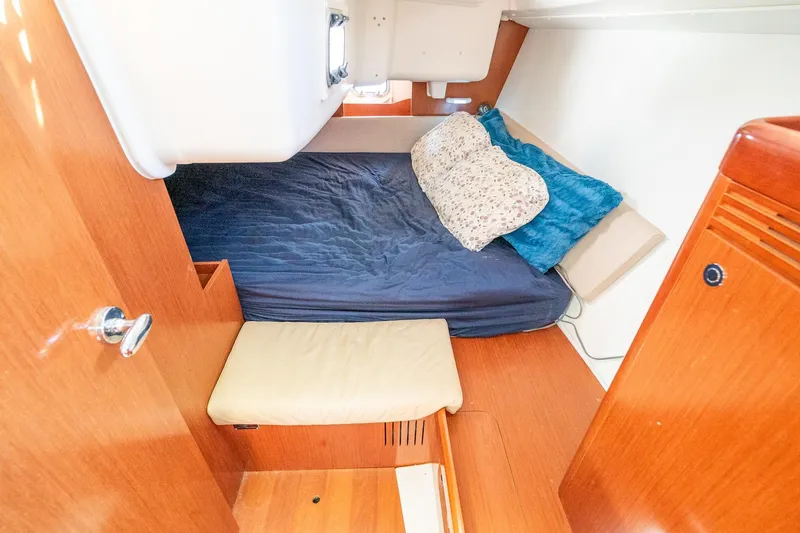 Slide: The Image of Cozy cabin interior of 2011 Beneteau Oceanis 37 sailboat with wooden finish. - 21
