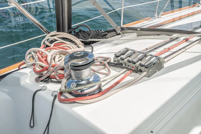Slide: The Image of Deck of 2011 Beneteau Oceanis 37 sailboat with winch and ropes. - 35