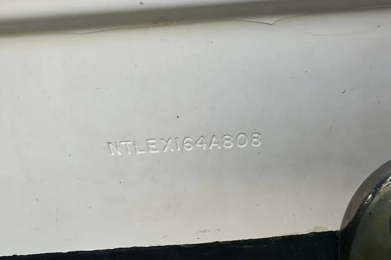 Slide: The Image of Control panel of a 2008 Grady-White Express 330 boat with Yamaha throttle. - 35