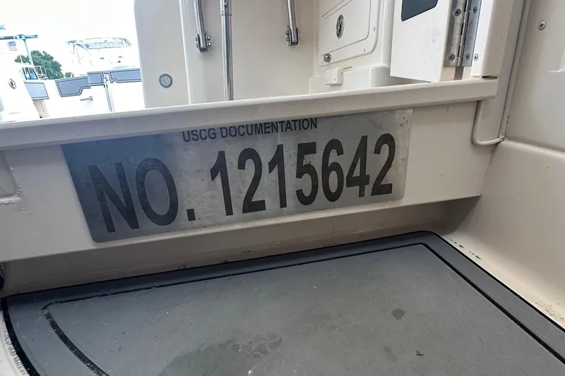 Slide: The Image of 2008 Grady-White Express 330 boat with USCG documentation number 1215642. - 51