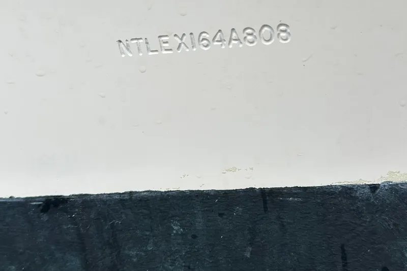 Slide: The Image of Hull identification number on 2008 Grady-White Express 330 boat. - 52